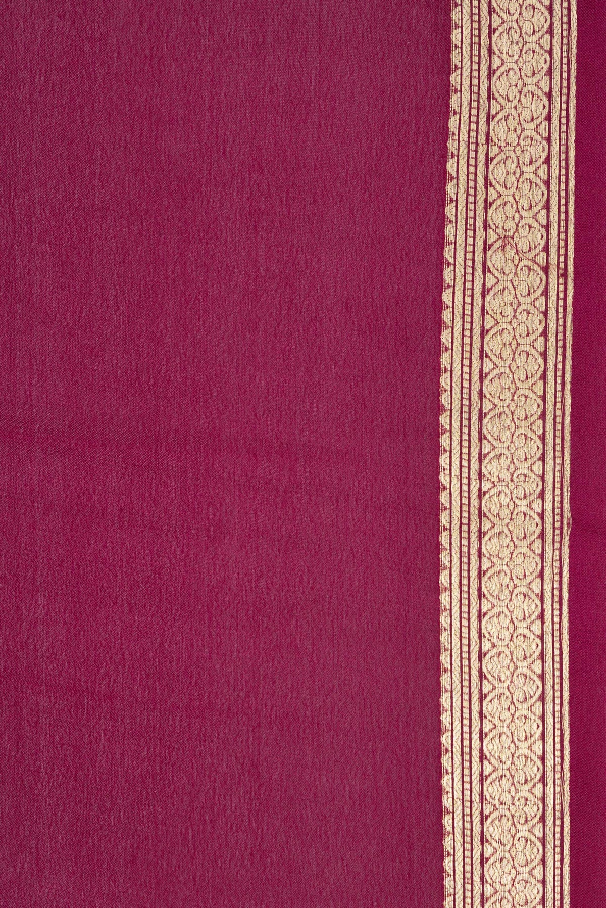 Border image of Magenta Dual Tone Georgette Saree with Plain Body and Zari Border. 