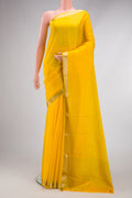 Yellow Mysore Crepe Saree with Plain Body and Zari Border.  displayed on a mannequin