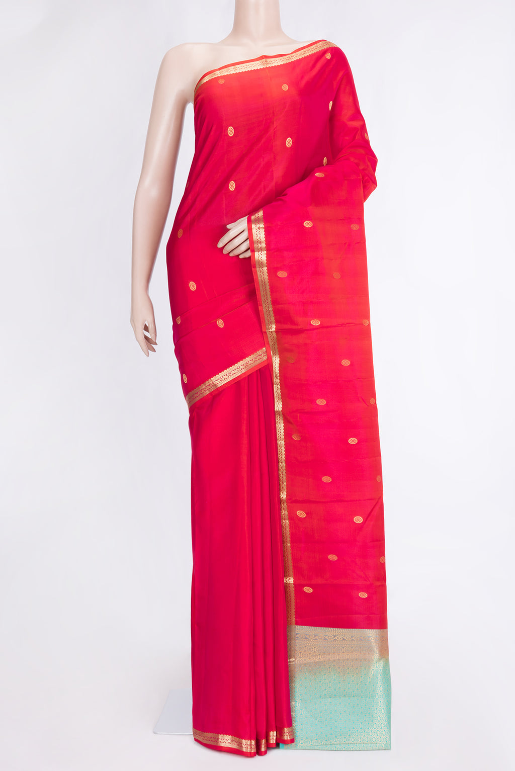 Pink Dual Tone Kanjivaram Silk Saree with Zari Butta on the body and Zari Border.  displayed on a mannequin