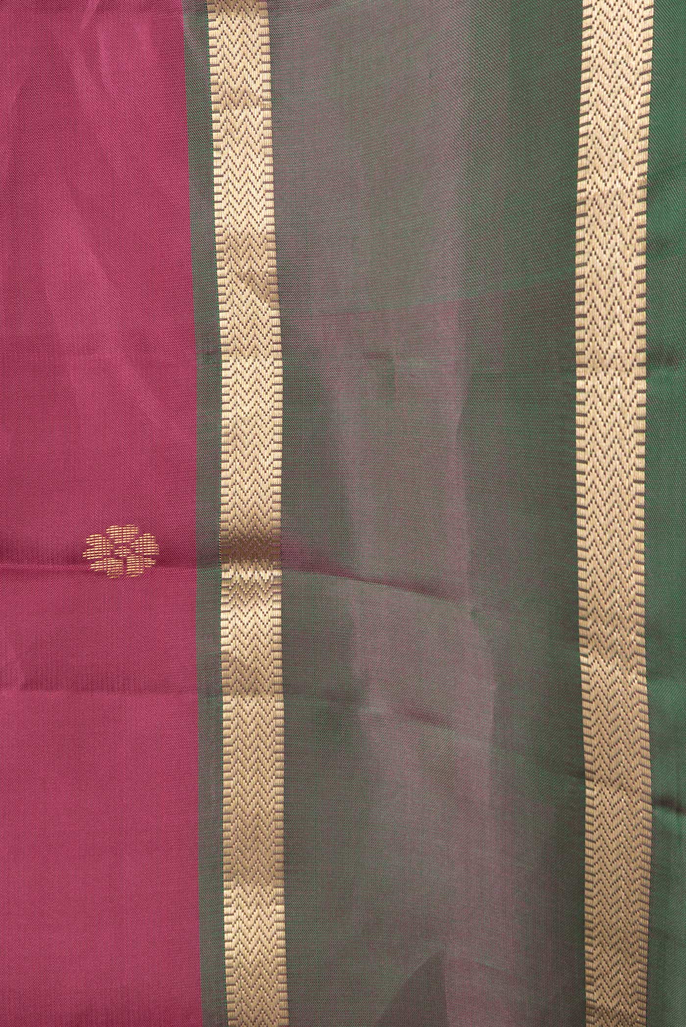 Border image of Dark Pink Dual Tone Kanjivaram Silk Saree with Zari Butta on the body and Zari Border. 