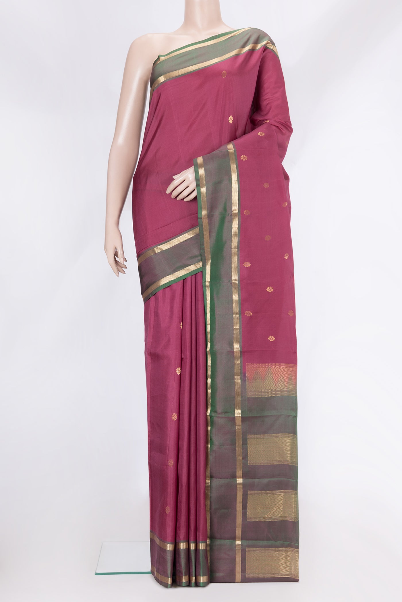 Dark Pink Dual Tone Kanjivaram Silk Saree with Zari Butta on the body and Zari Border.  displayed on a mannequin