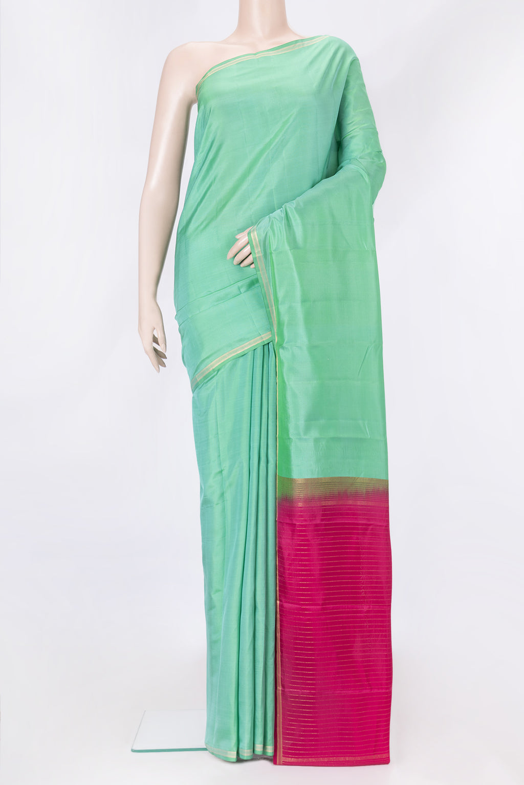Sea Green Dual Tone Kanjivaram Silk Saree with Plain Body and Thin Zari Line.  displayed on a mannequin