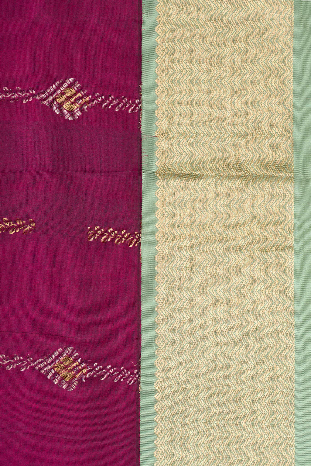 Border image of Magenta Dual Tone Kanchipuram Silk Saree with Zari Butta on the body and Zari Border. 