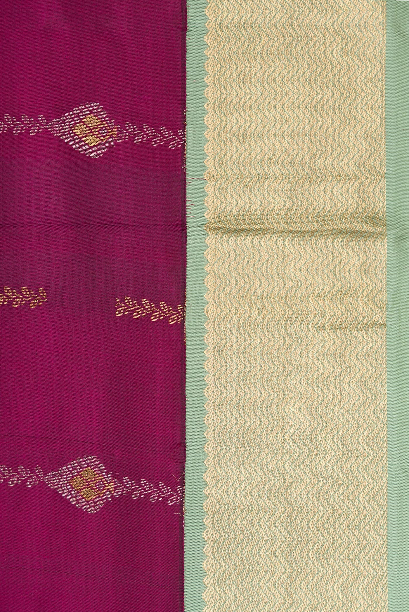 Border image of Magenta Dual Tone Kanchipuram Silk Saree with Zari Butta on the body and Zari Border. 