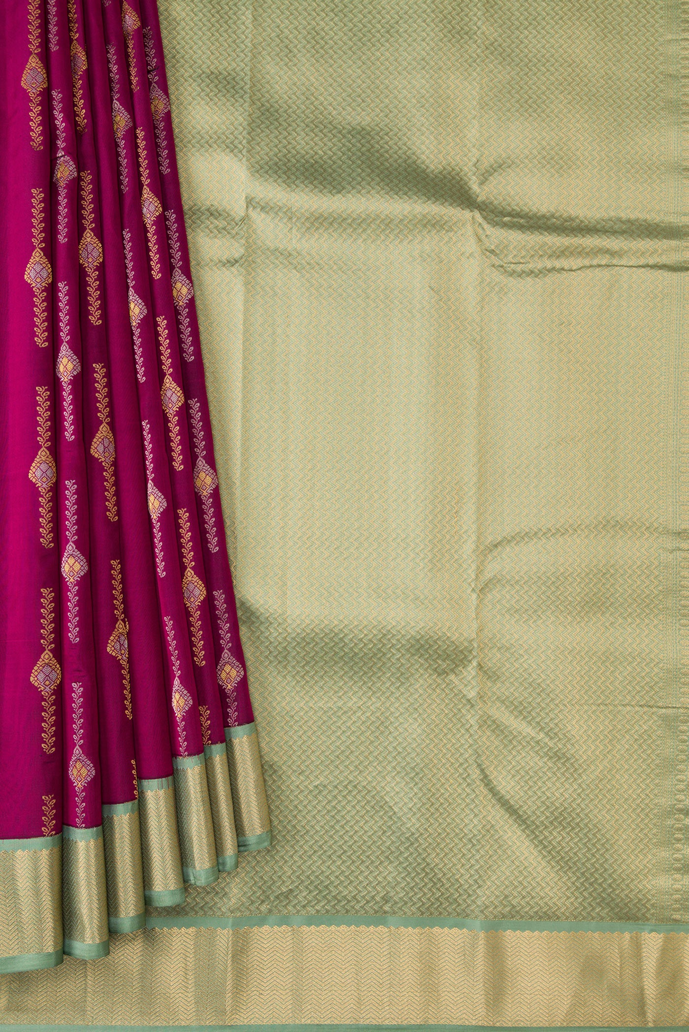 Pleats and pallu of Magenta Dual Tone Kanchipuram Silk Saree with Zari Butta on the body and Zari Border. 