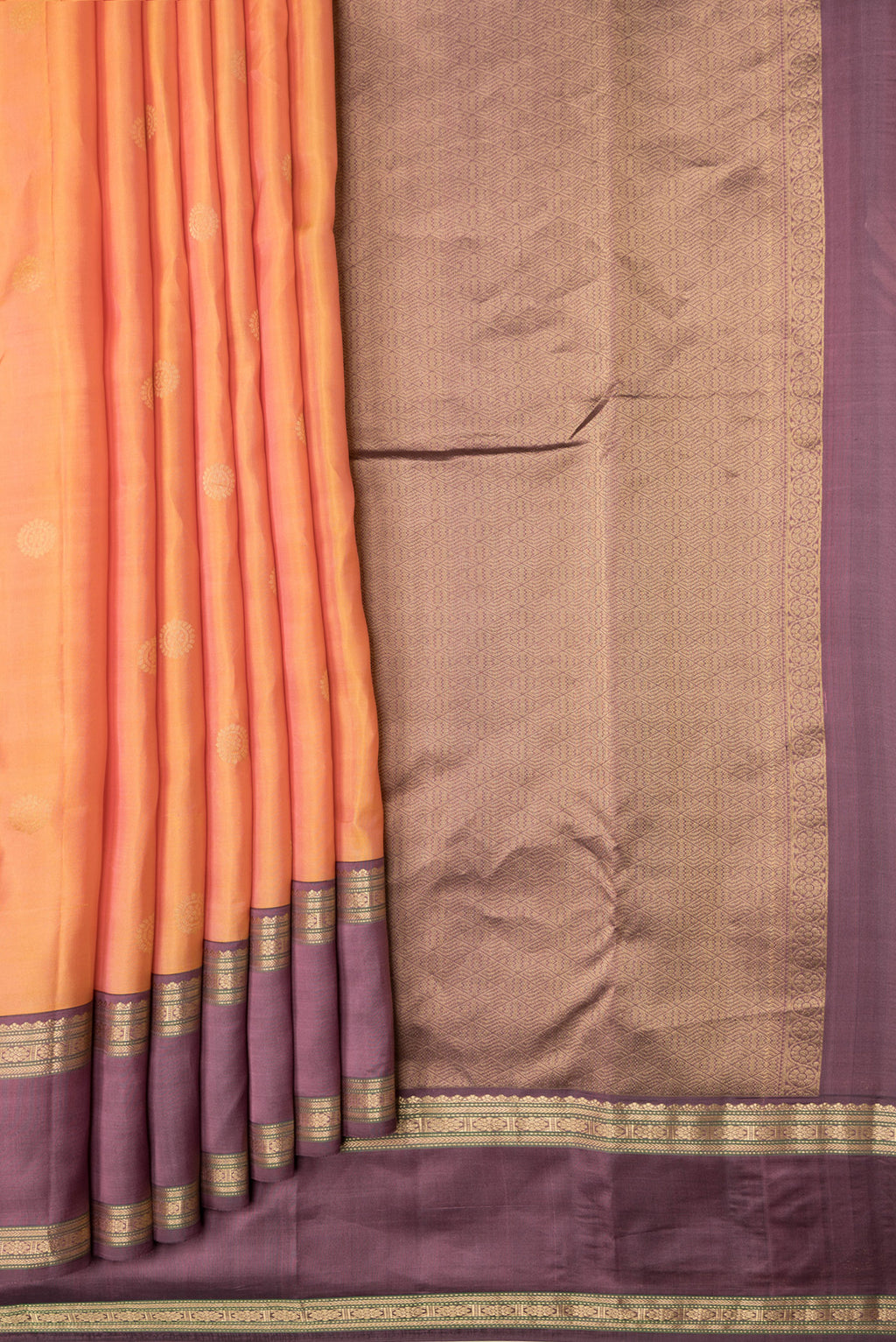 Pleats and pallu of Sandal Dual Tone Kanchipuram Silk Saree with Zari Butta on the body and Zari Border. 