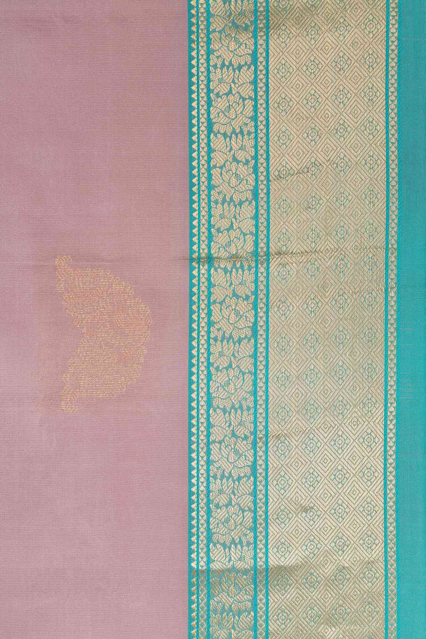 Border image of Rose Gold Dual Tone Kanchipuram Silk Saree with Zari Butta on the body and Zari Border. 