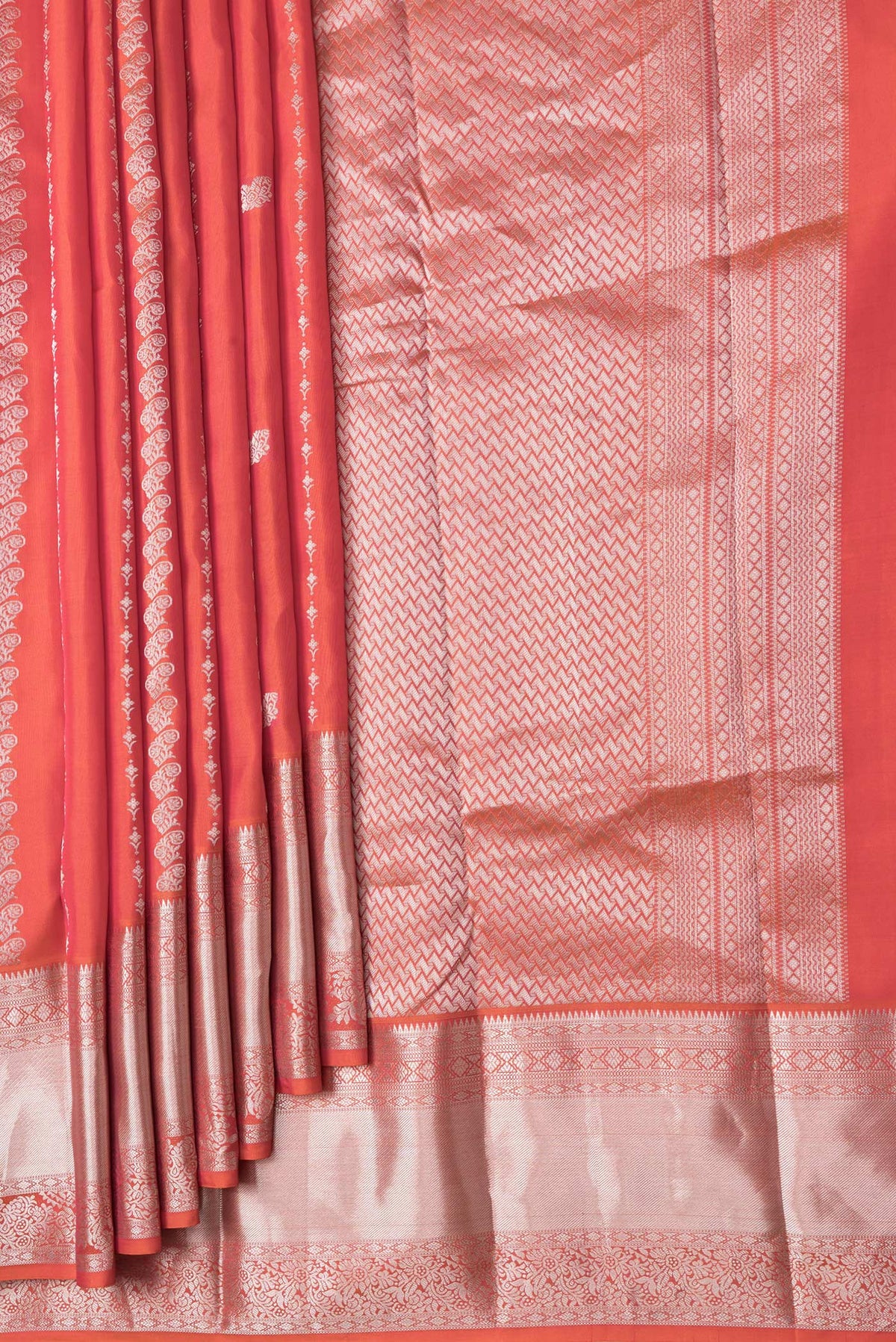Pleats and pallu of Coral Dual Tone Kanchipuram Silk Saree with Zari Butta on the body and Zari Border. 
