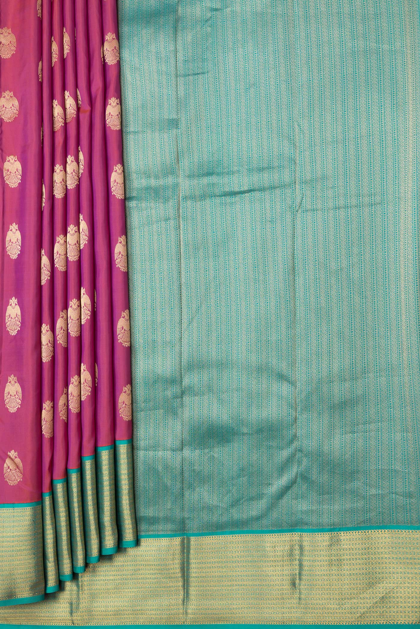 Pleats and pallu of Pink Dual Tone Kanchipuram Silk Saree with Zari Butta on the body and Zari Border. 