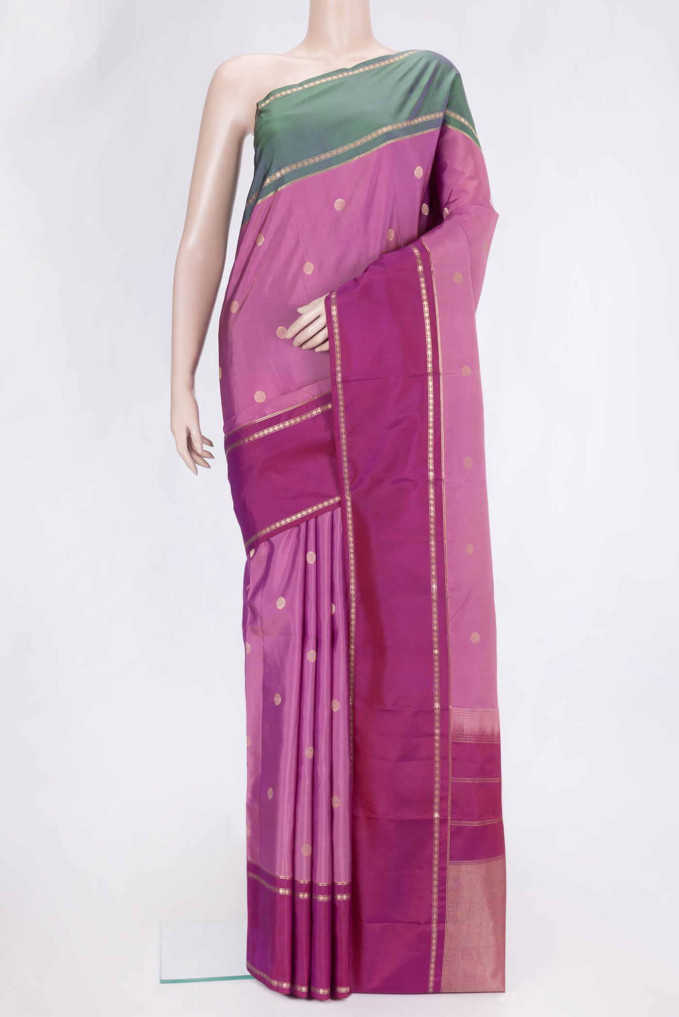 Pink Dual Tone Kanchipuram Silk Saree with Zari Butta on the body and Ganga Jamuna Border.  displayed on a mannequin