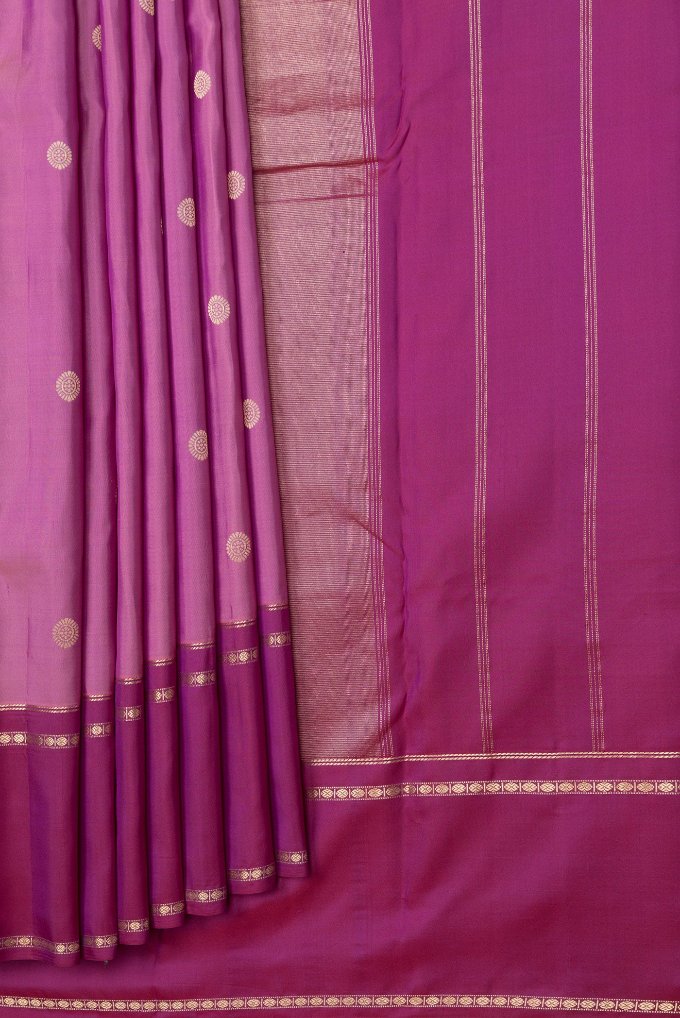 Pleats and pallu of Pink Dual Tone Kanchipuram Silk Saree with Zari Butta on the body and Ganga Jamuna Border. 
