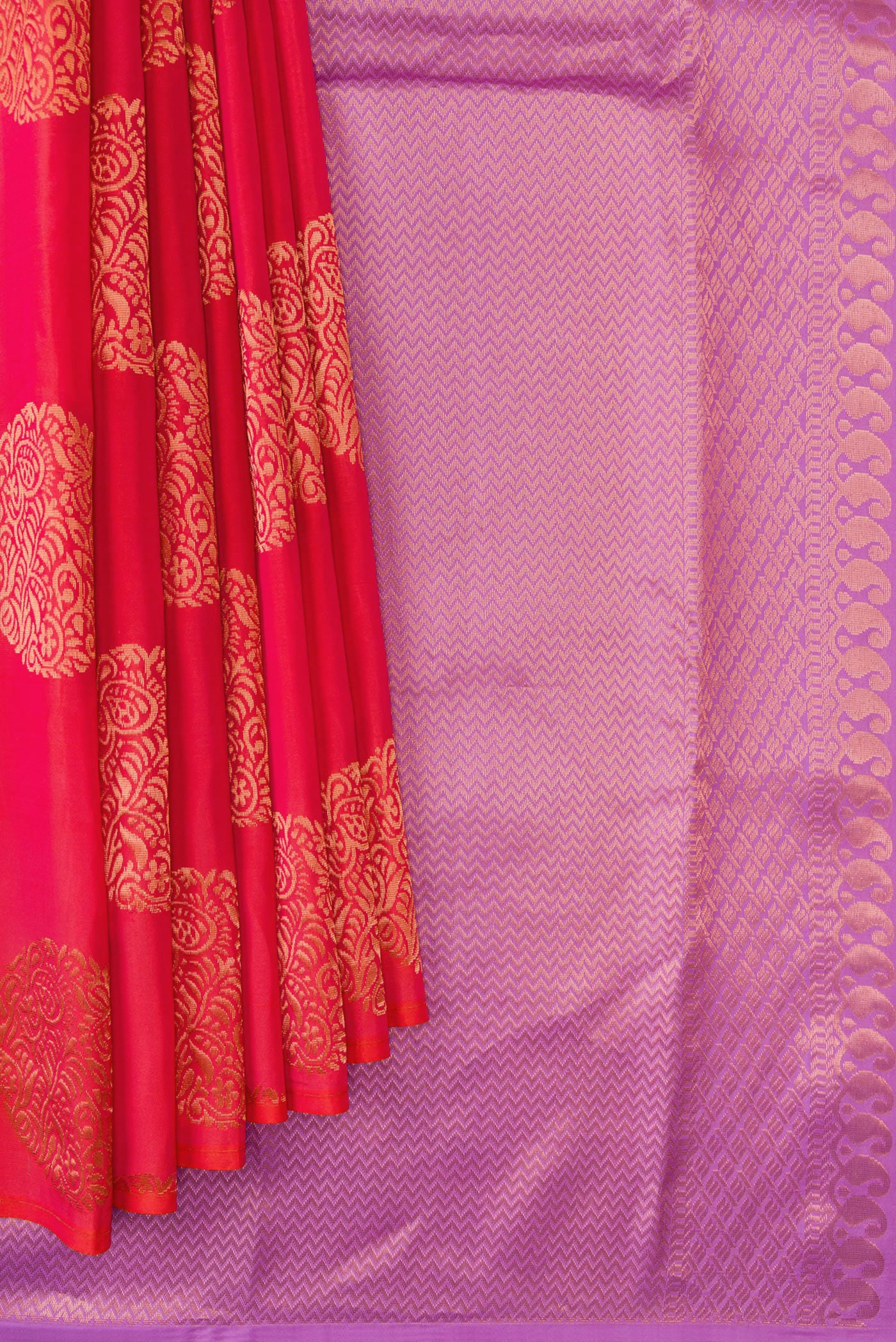 Pleats and pallu of Orange Dual Tone Kanjivaram Silk Saree with Zari Butta on the body and Without Border. 