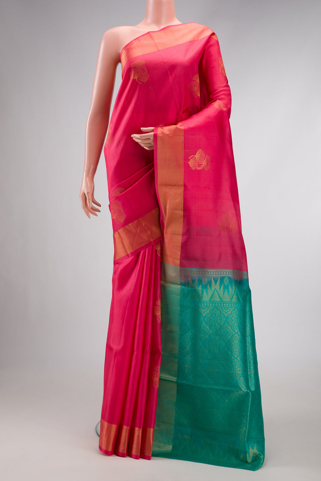 Pink Dual Tone Soft Silk Saree with Zari Butta on the body and Zari Border.  displayed on a mannequin