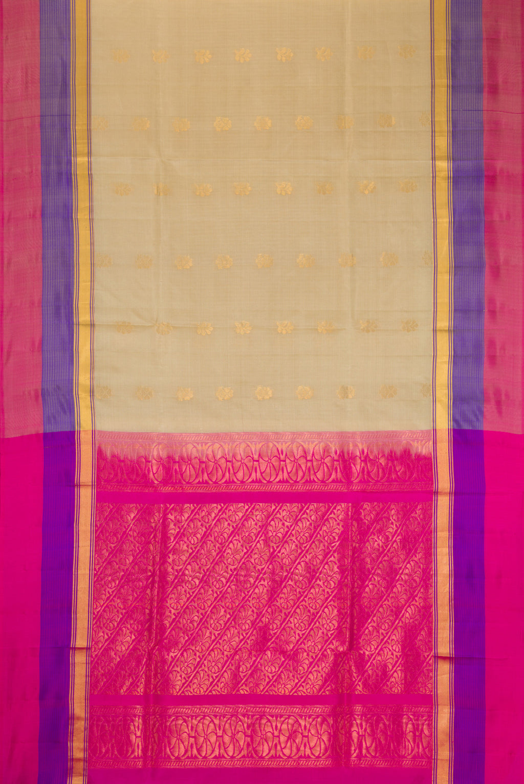 Beige Soft Silk Saree with Zari Butta on the body and Zari Border.  displayed on a mannequin