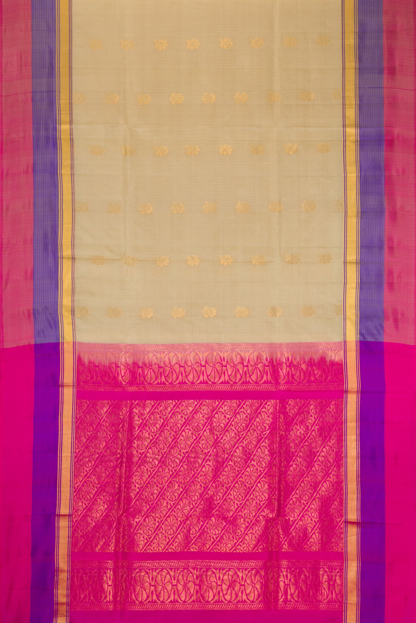Beige Soft Silk Saree with Zari Butta on the body and Zari Border.  displayed on a mannequin