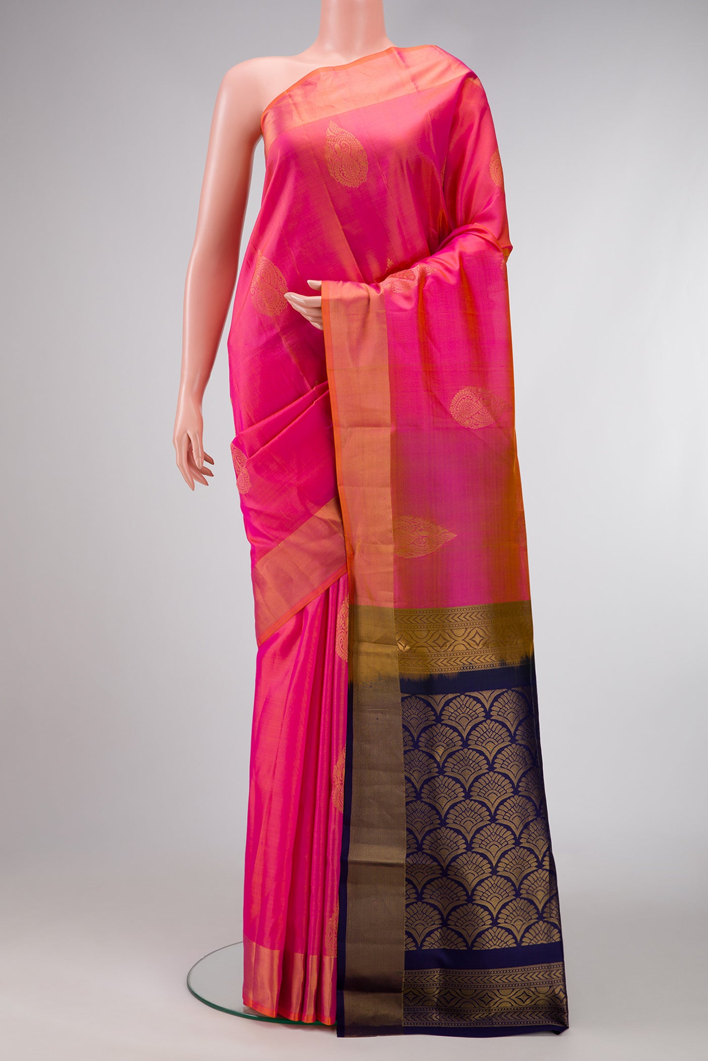 Pink Dual Tone Soft Silk Saree with Zari Butta on the body and Zari Border.  displayed on a mannequin