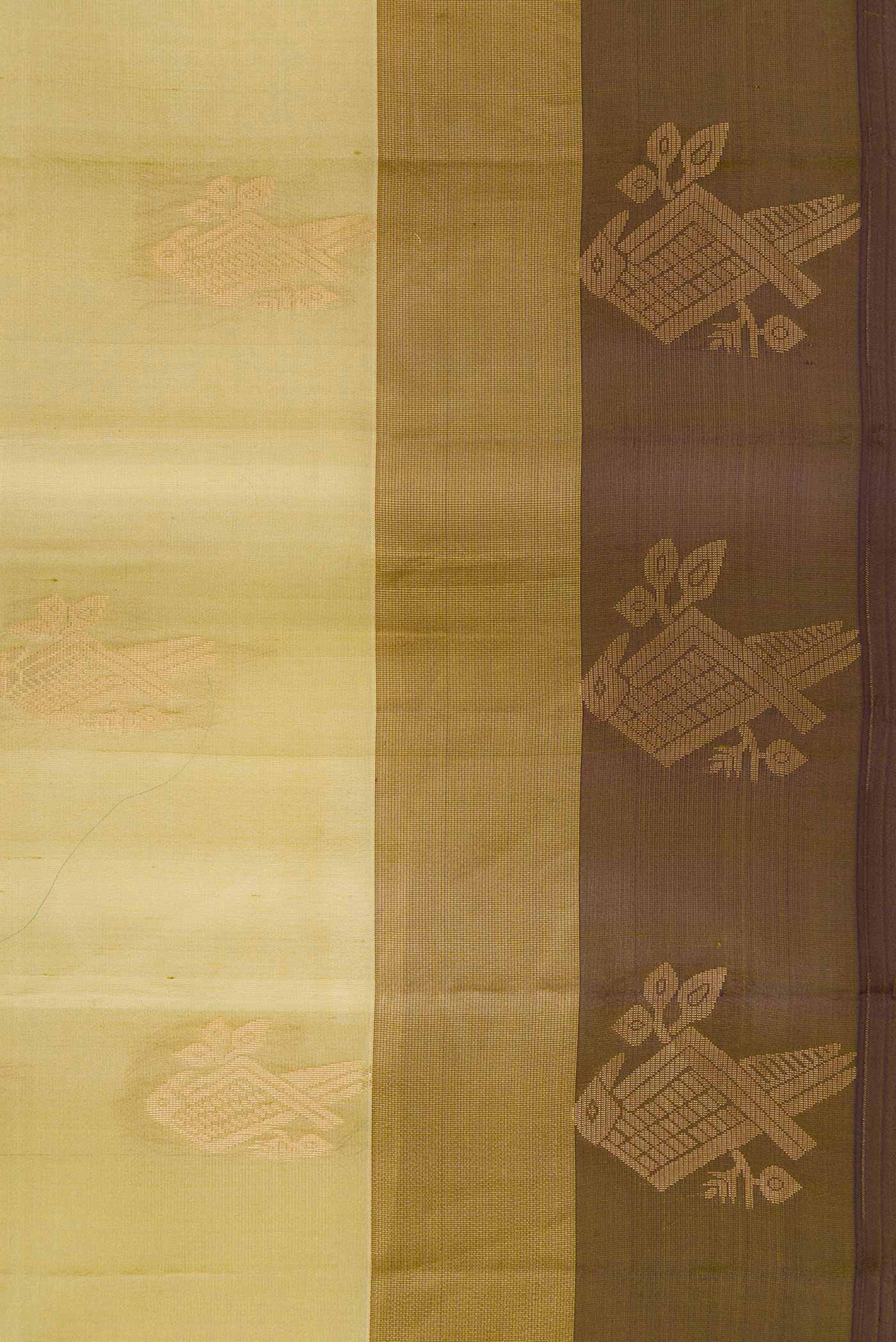 Border image of Mehandi Green Dual Tone Soft Silk Saree with Zari Butta on the body and Zari Border. 