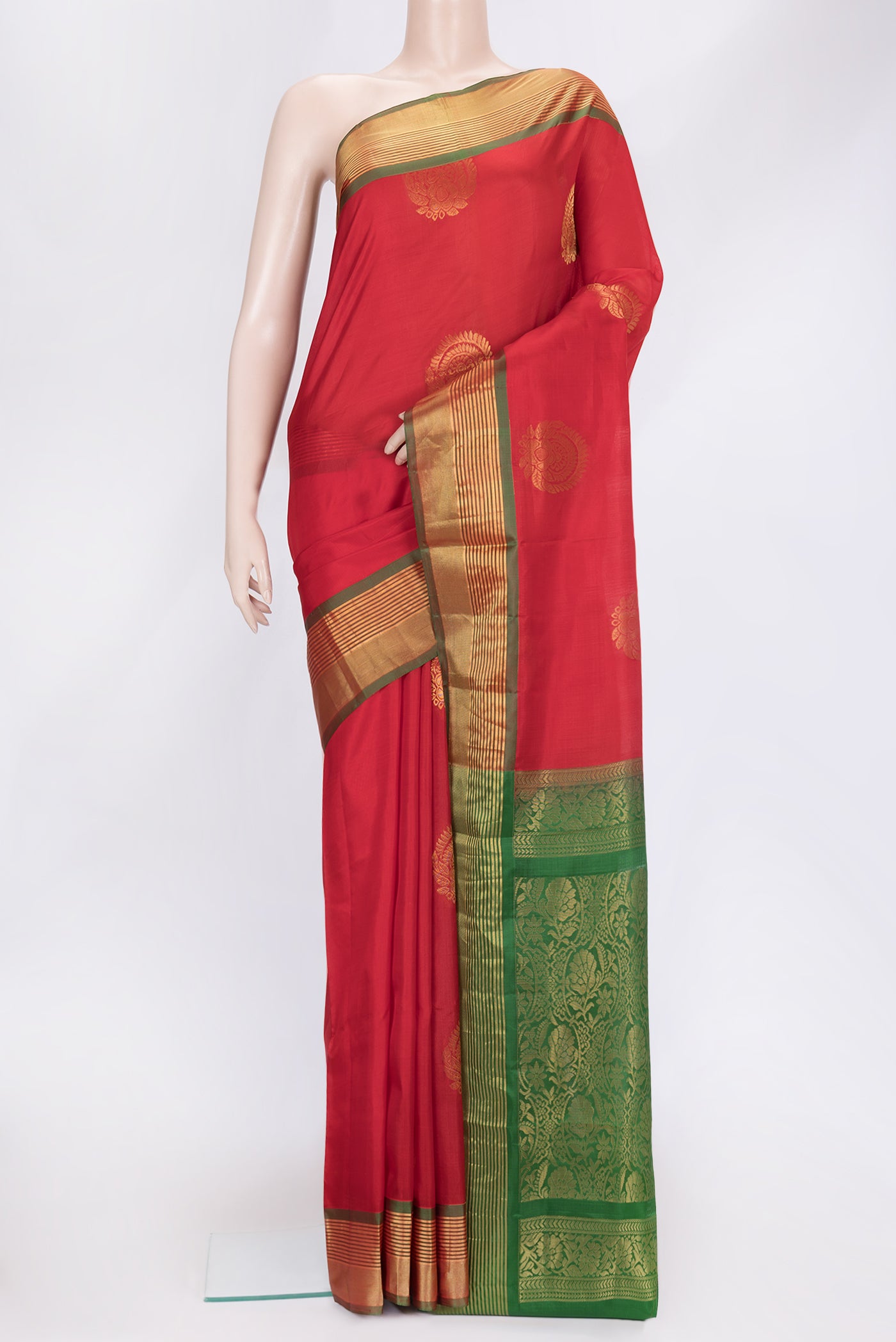 Red Dual Tone Soft Silk Saree with Zari Butta on the body and Zari Border.  displayed on a mannequin