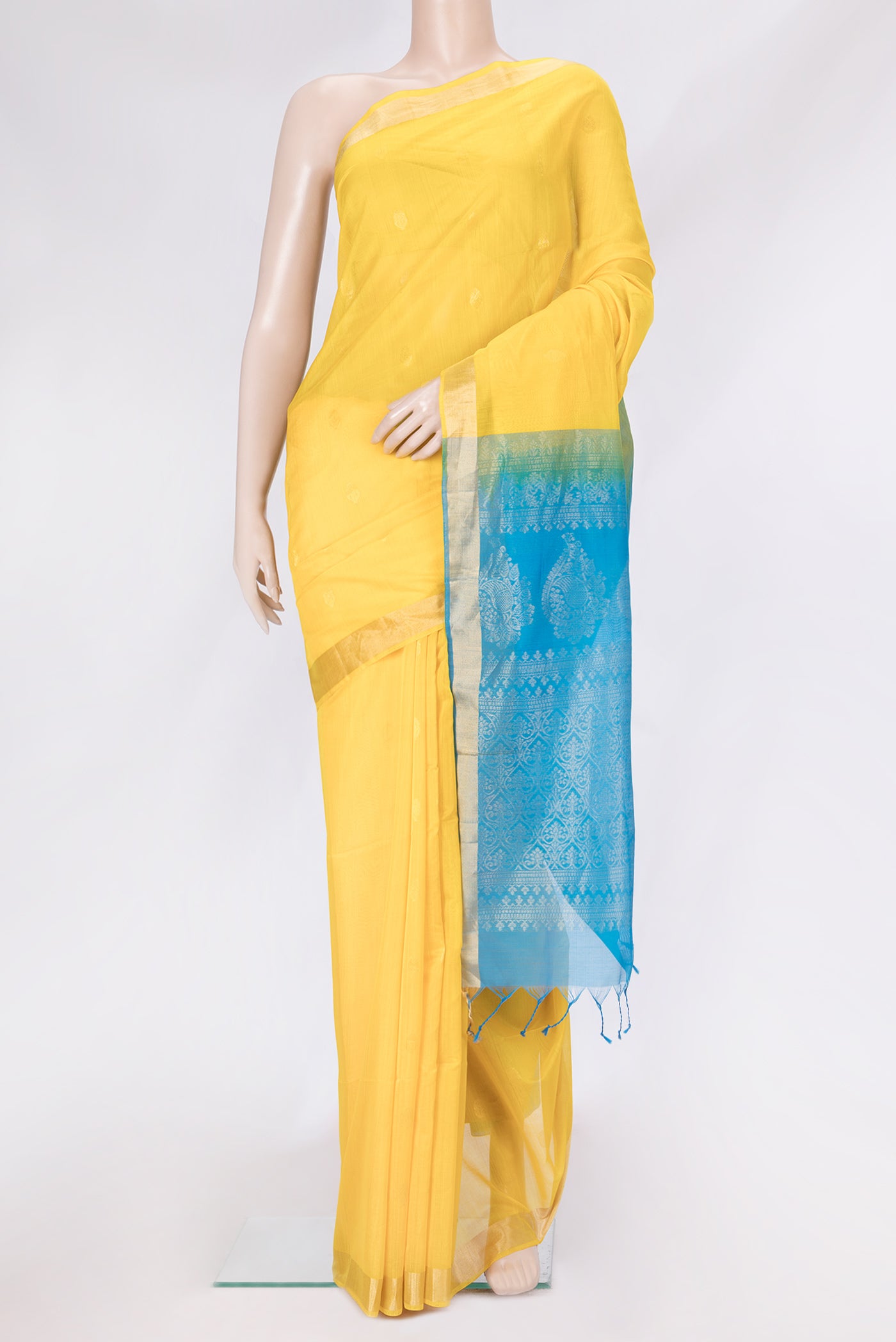 Yellow Dual Tone Silk Cotton Saree with Zari Butta on the body and Zari Border.  displayed on a mannequin