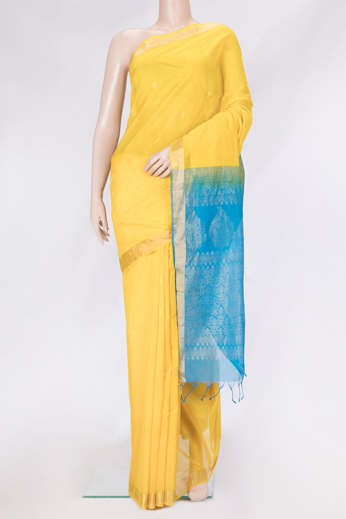 Yellow Dual Tone Silk Cotton Saree with Zari Butta on the body and Zari Border.  displayed on a mannequin