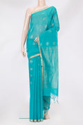 Sky Blue Silk Cotton Saree with Zari Butta on the body and Zari Border.  displayed on a mannequin