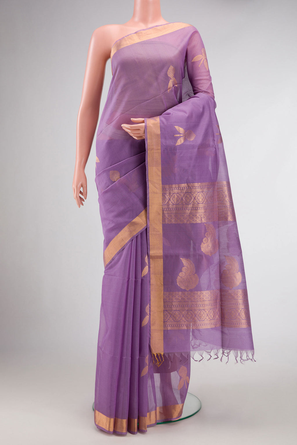 Lavender Dual Tone Silk Cotton Saree with Zari Butta on the body and Zari Border.  displayed on a mannequin