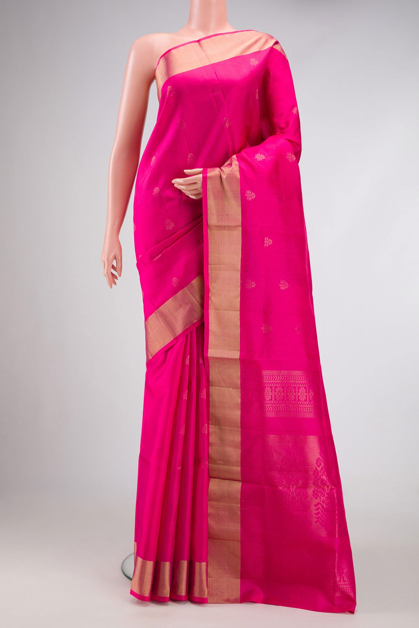 Dark Pink Dual Tone Soft Silk Saree with Zari Butta on the body and Zari Border.  displayed on a mannequin