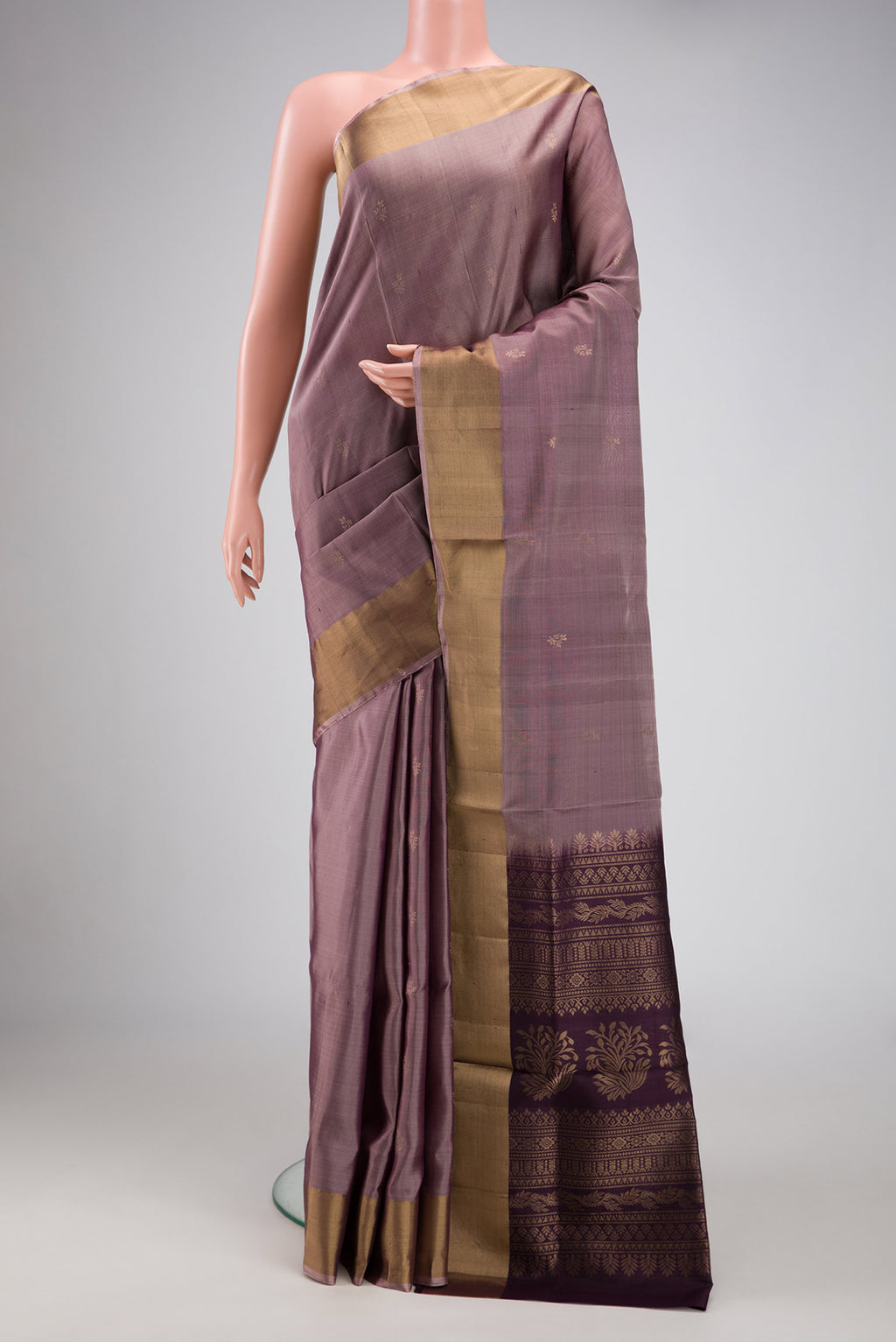 Purple Dual Tone Soft Silk Saree with Zari Butta on the body and Zari Border.  displayed on a mannequin