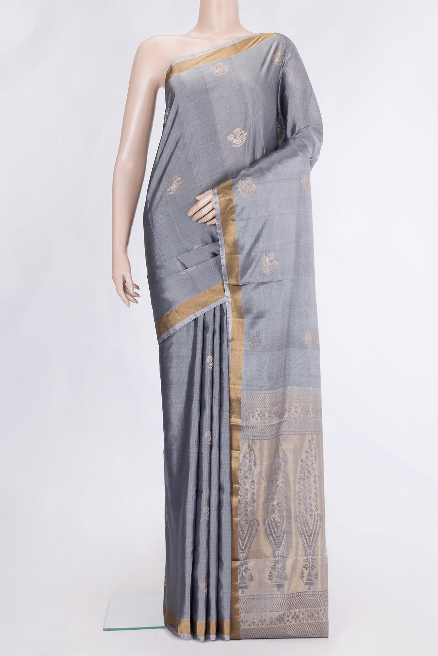 Grey Dual Tone Soft Silk Saree with Zari Butta on the body and Zari Border.  displayed on a mannequin