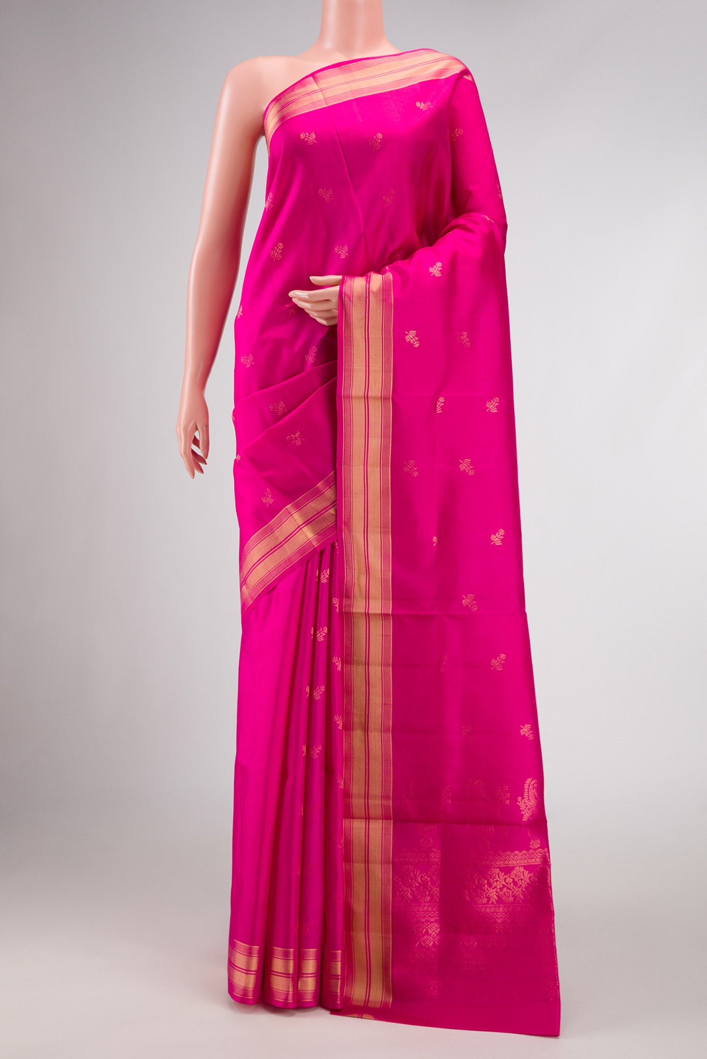 Pink Dual Tone Soft Silk Saree with Zari Butta on the body and Zari Border displayed on a mannequin
