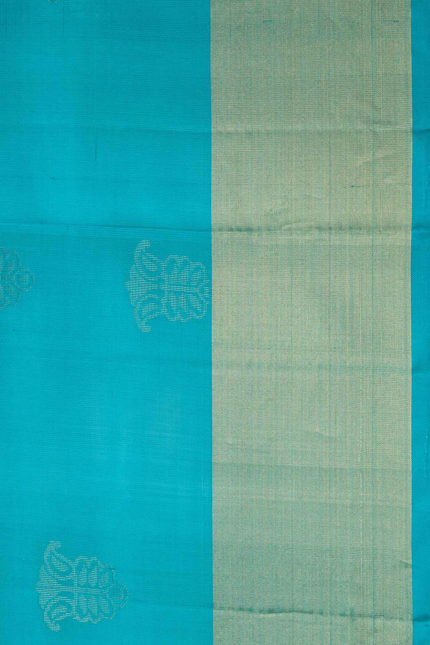 Border image of Sky Blue Dual Tone Soft Silk Saree with Zari Butta on the body and Zari Border. 
