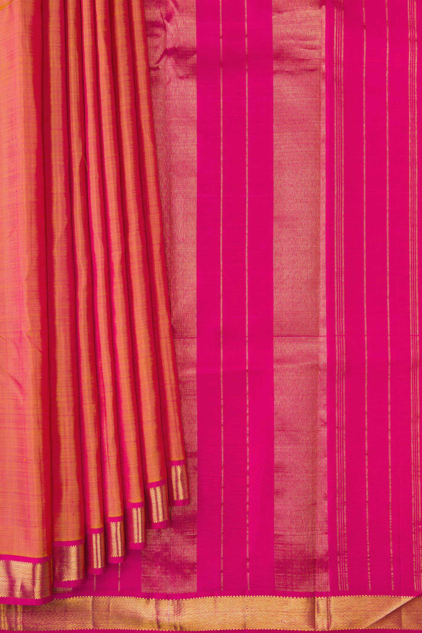 Pleats and pallu of Mustard Dual Tone Kanjivaram Silk Saree with Plain Body and Zari Border. 