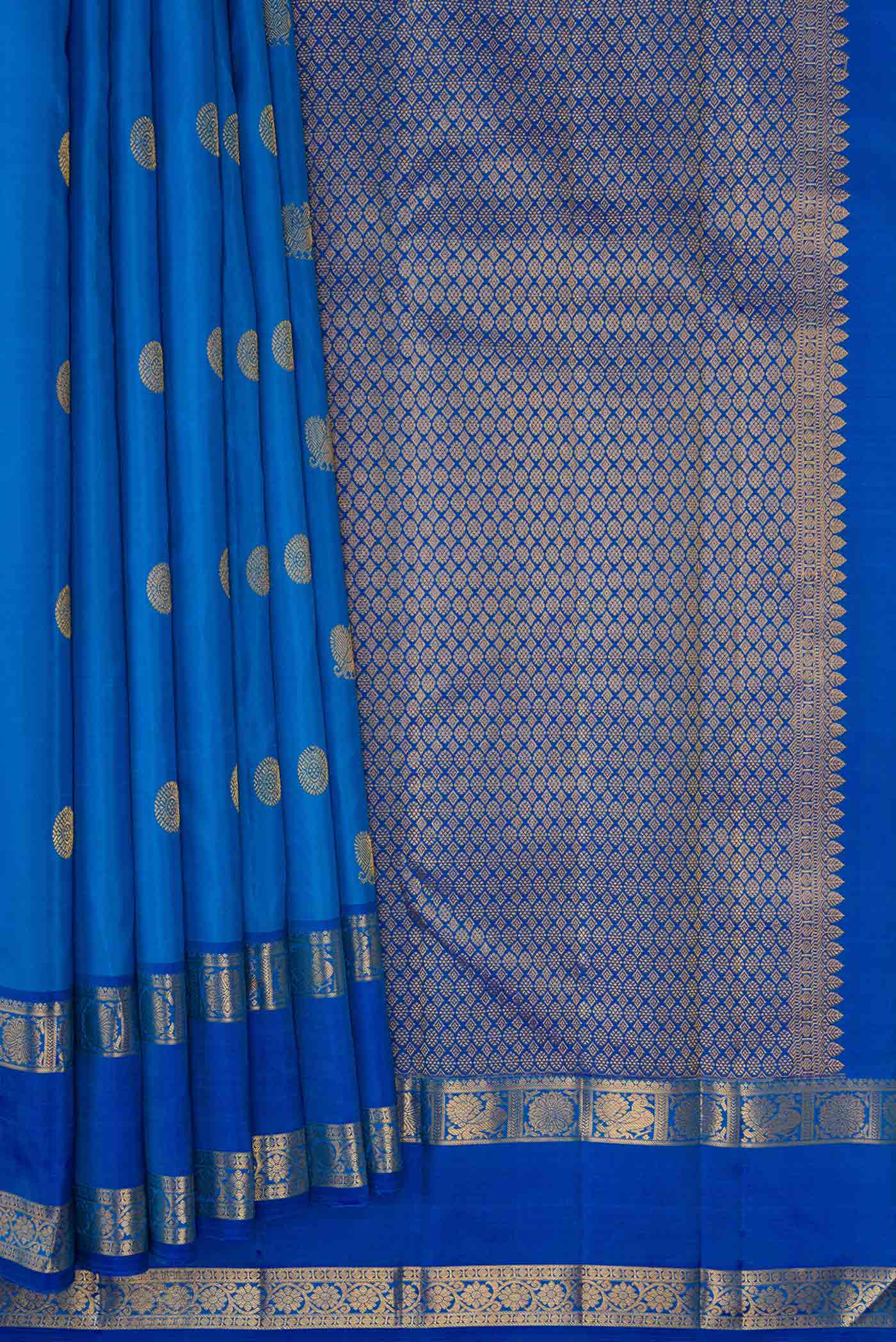 Pleats and pallu of Royal Blue Kanchipuram Silk Saree with Zari Butta on the body and Zari Border