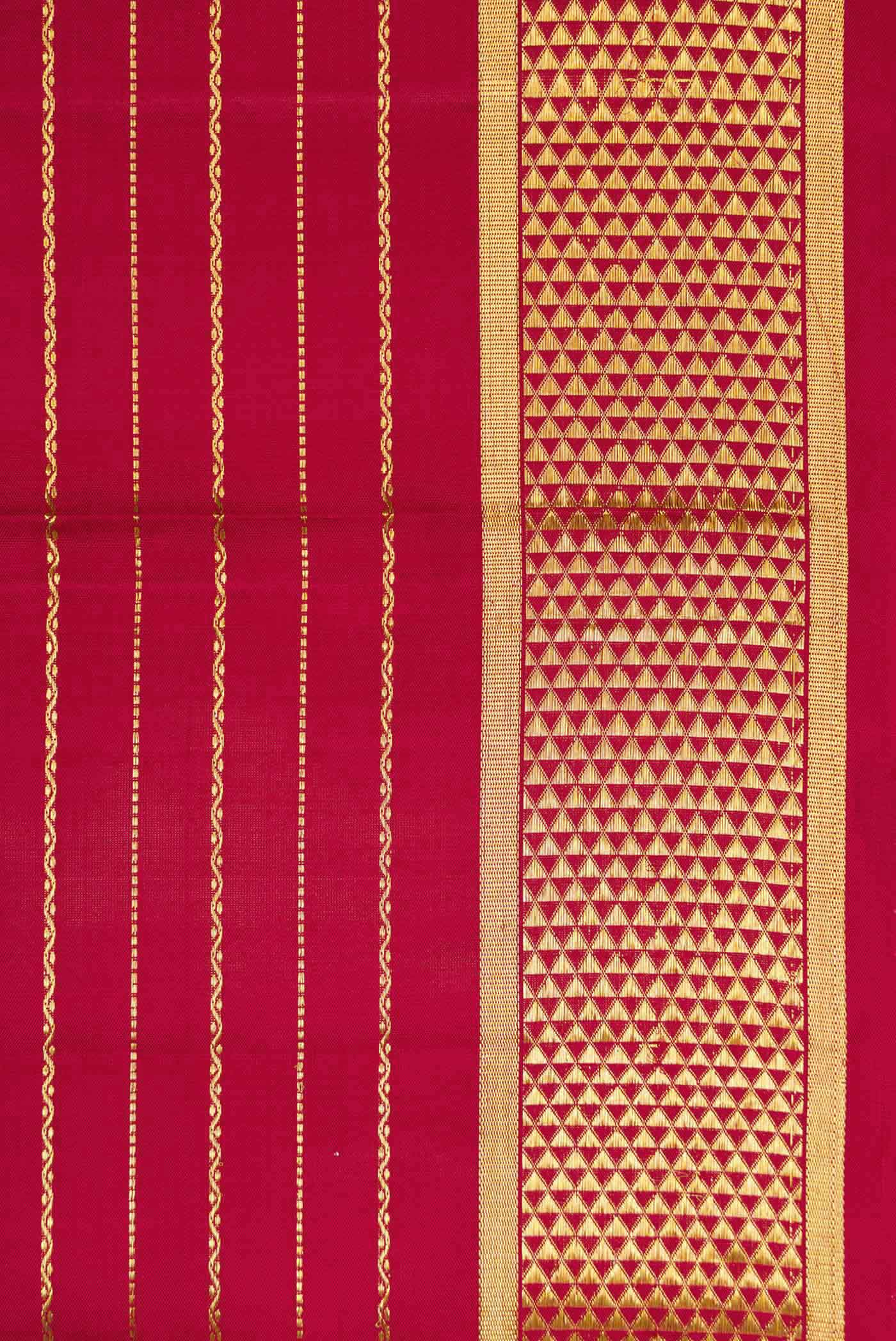 Border image of Maroon Dual Tone Kanchipuram Silk Saree with Checked design on the body and Zari Border. 