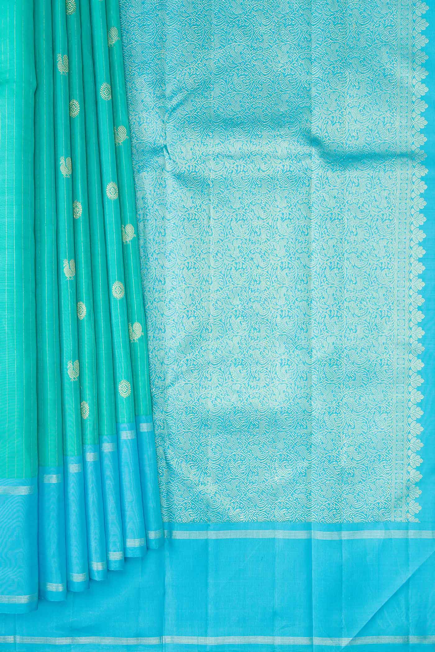 Pleats and pallu of Sea Green Dual Tone Kanchipuram Silk Saree with Stripes on the body and Zari Border. 