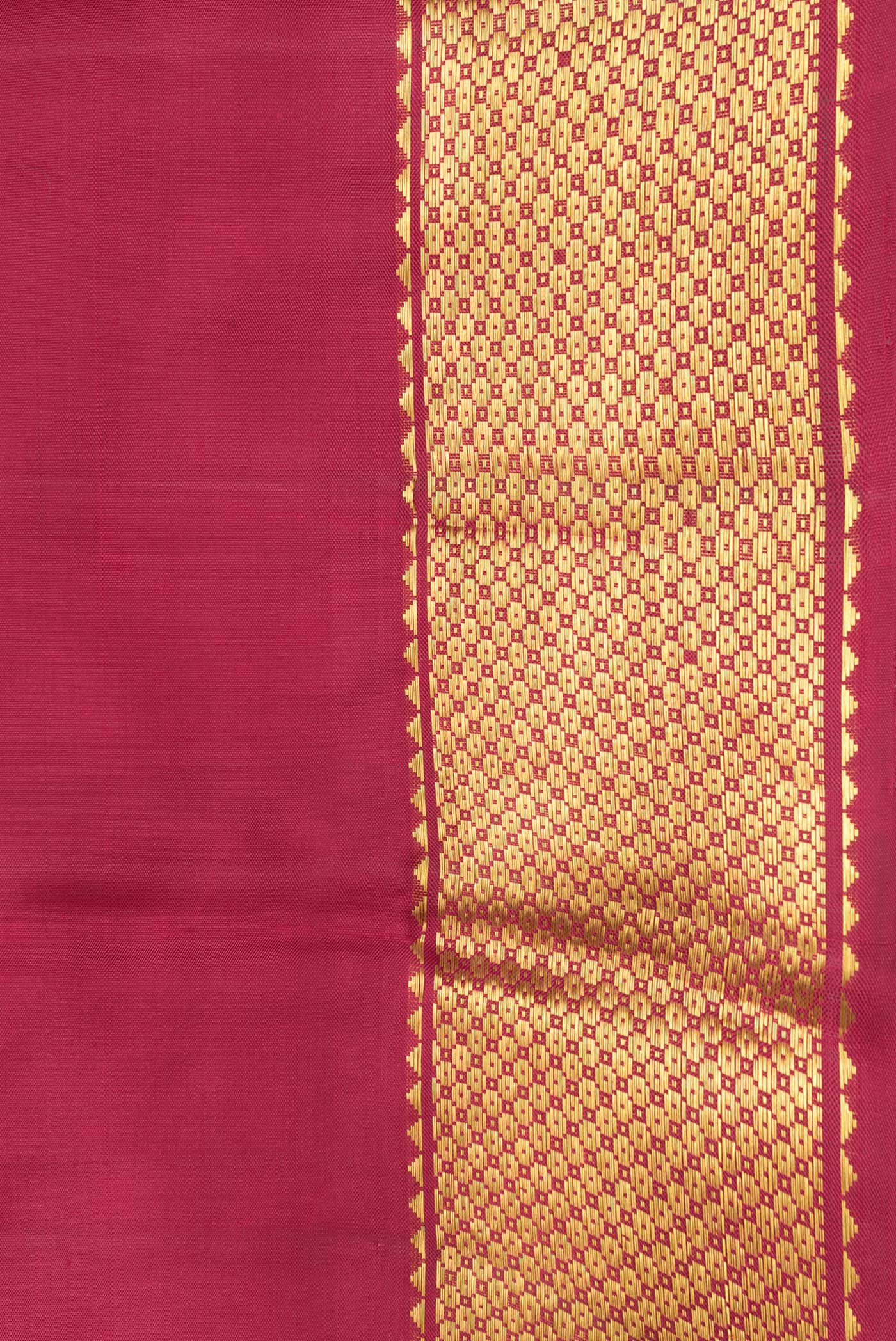 Border image of Maroon Dual Tone Kanchipuram Silk Saree with Plain Body and Zari Border. 