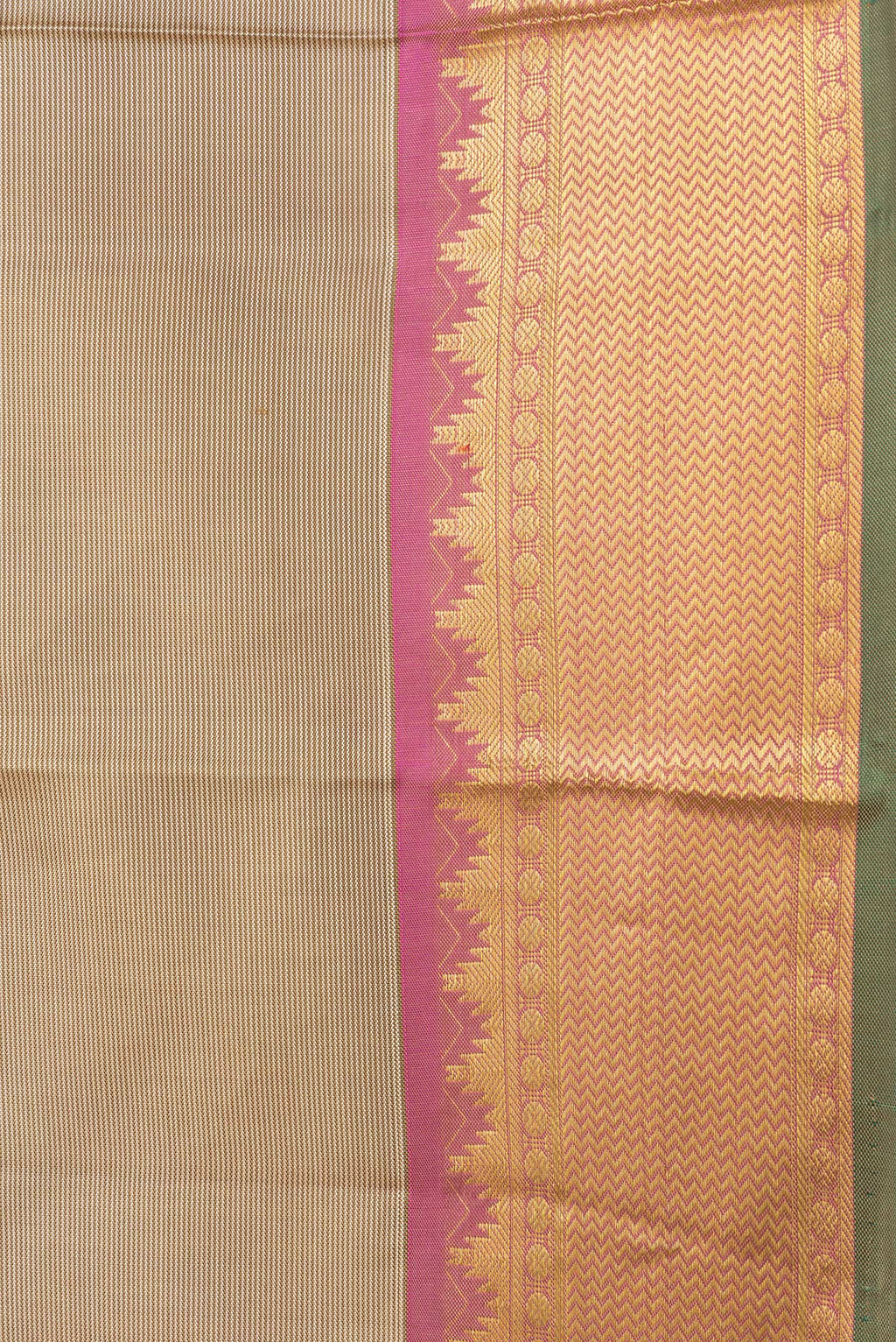 Border image of Pista Green Dual Tone Kanchipuram Silk Saree with Stripes on the body and Zari Border. 
