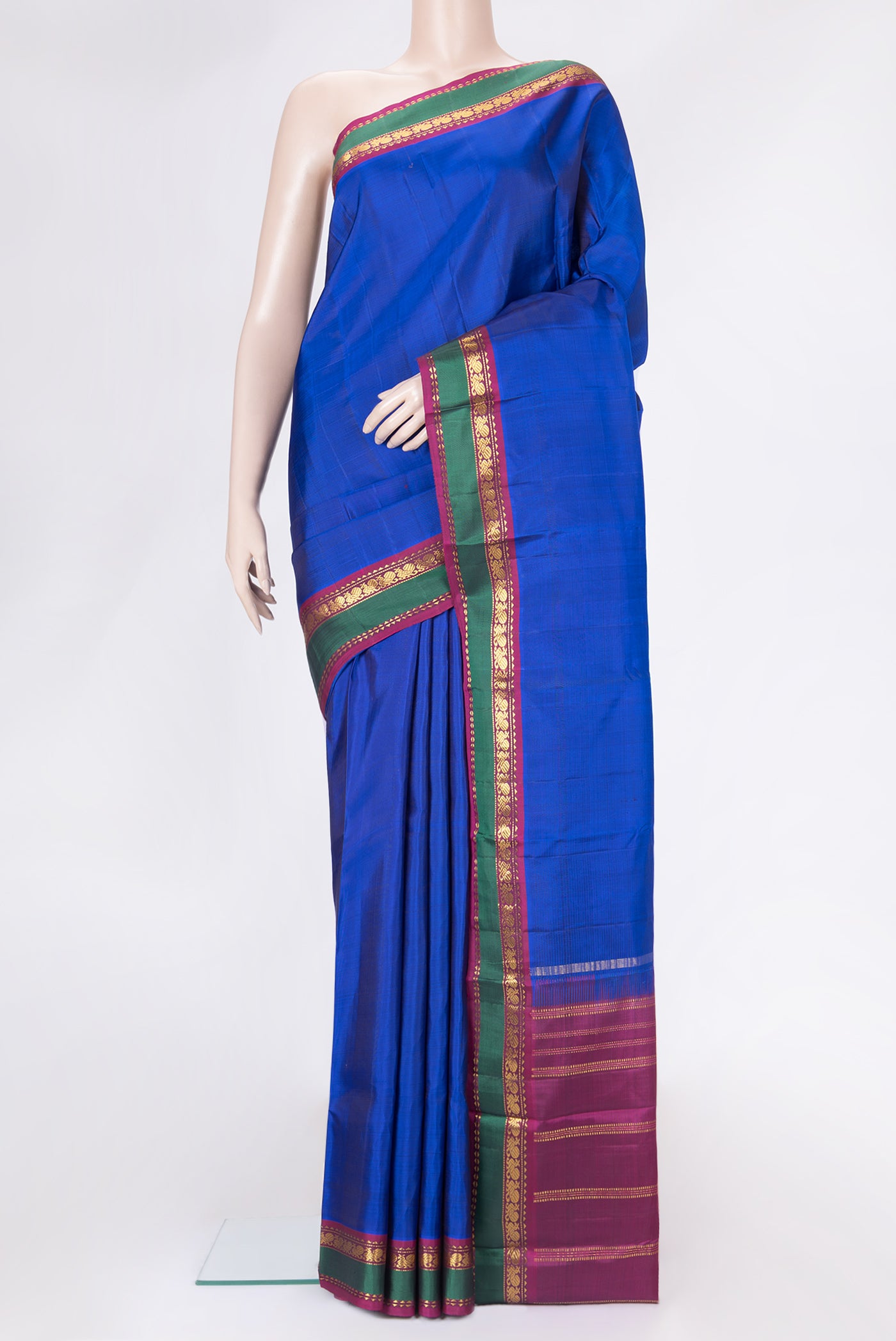 Royal Blue Dual Tone Kanchipuram Silk Saree with Plain Body and Zari Border.  displayed on a mannequin