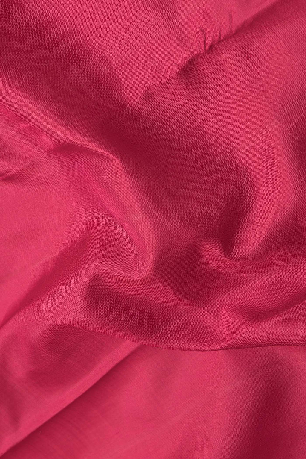 Close up of Pink Dual Tone Kanjivaram Silk Saree with Plain Body and Zari Border.  displaying folds