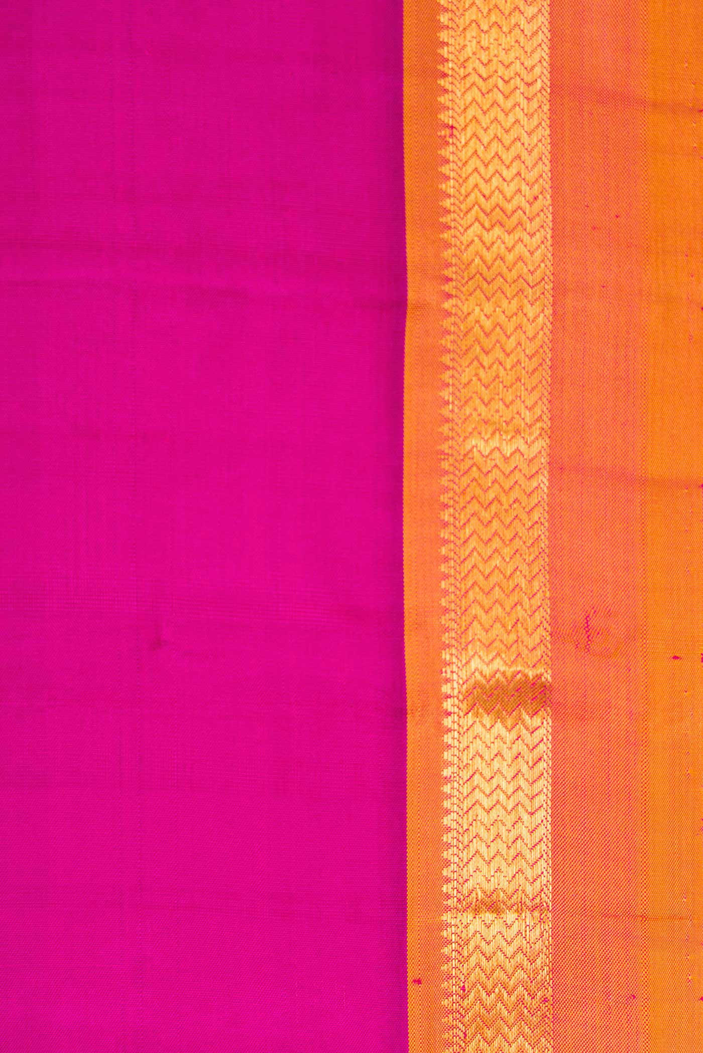Border image of Magenta Dual Tone Kanjivaram Silk Saree with Plain Body and Zari Border. 