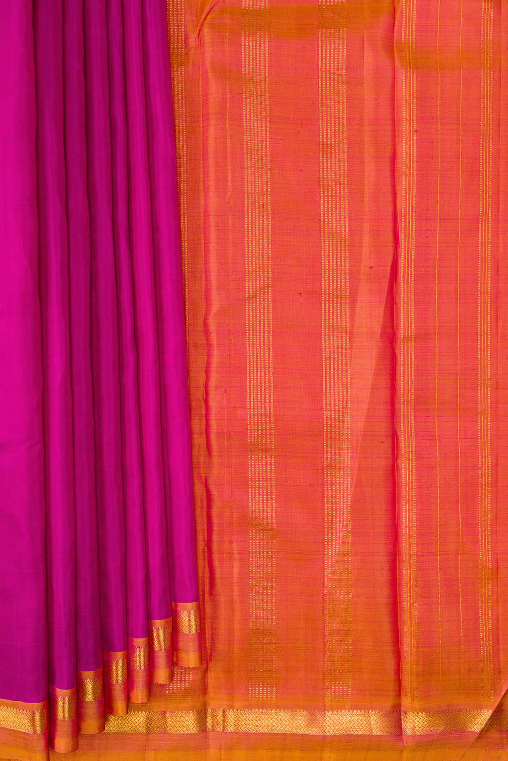 Pleats and pallu of Magenta Dual Tone Kanjivaram Silk Saree with Plain Body and Zari Border. 