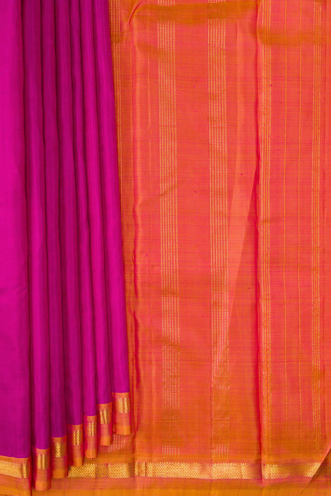 Pleats and pallu of Magenta Dual Tone Kanjivaram Silk Saree with Plain Body and Zari Border. 