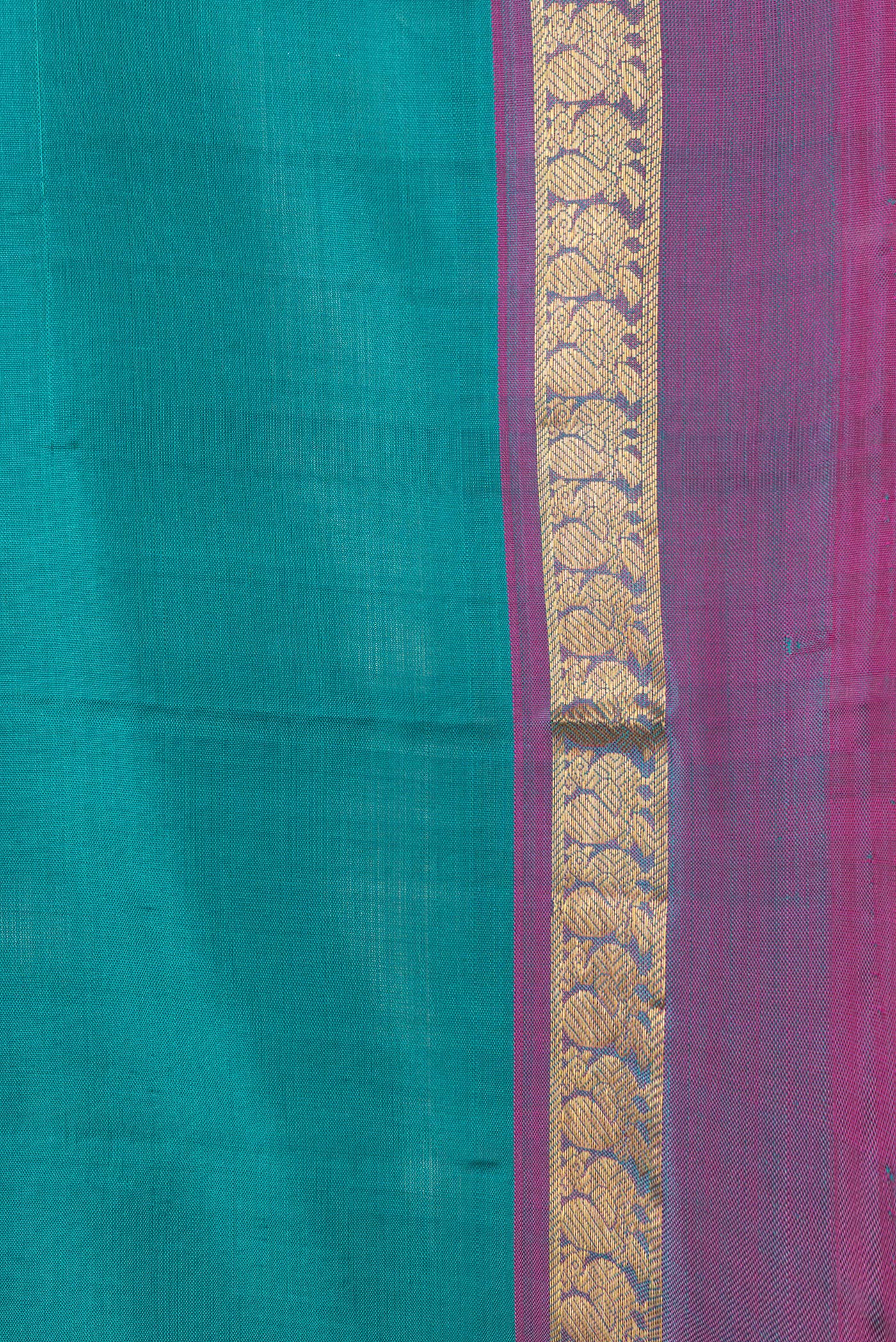 Border image of Green Dual Tone Kanjivaram Silk Saree with Plain Body and Zari Border. 