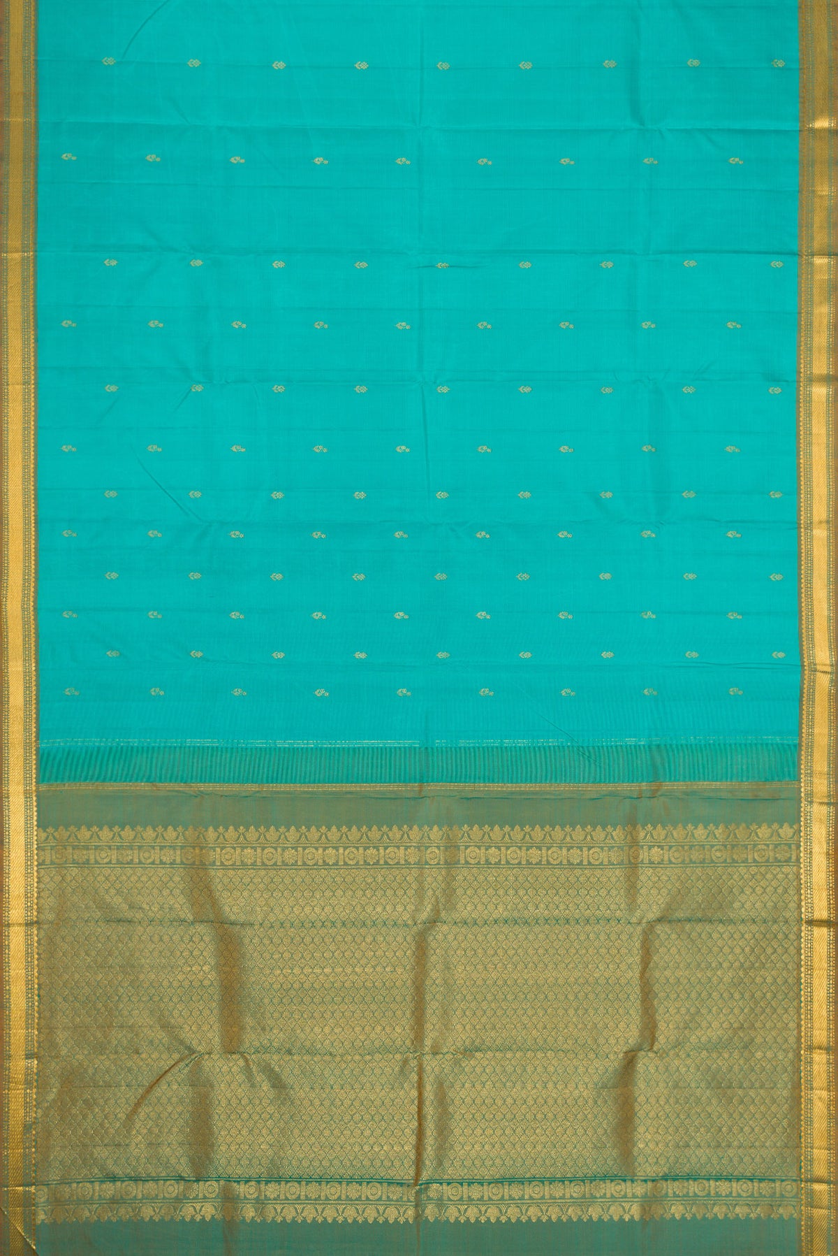Flat view of Sea Green Dual Tone Kanchipuram Silk Saree with Zari Butta on the body and Zari Border. 