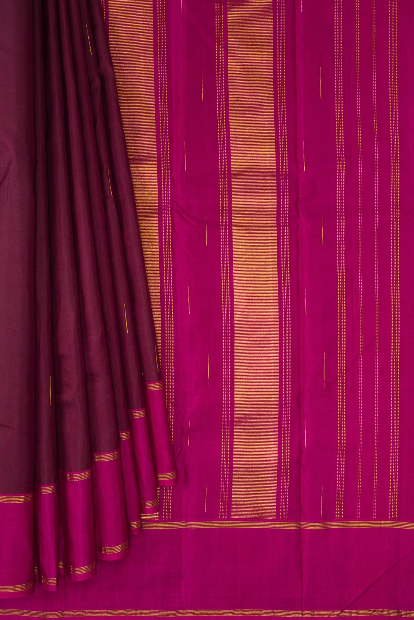 Pleats and pallu of Burgundy Dual Tone Kanjivaram Silk Saree with Zari Butta on the body and Zari Border. 