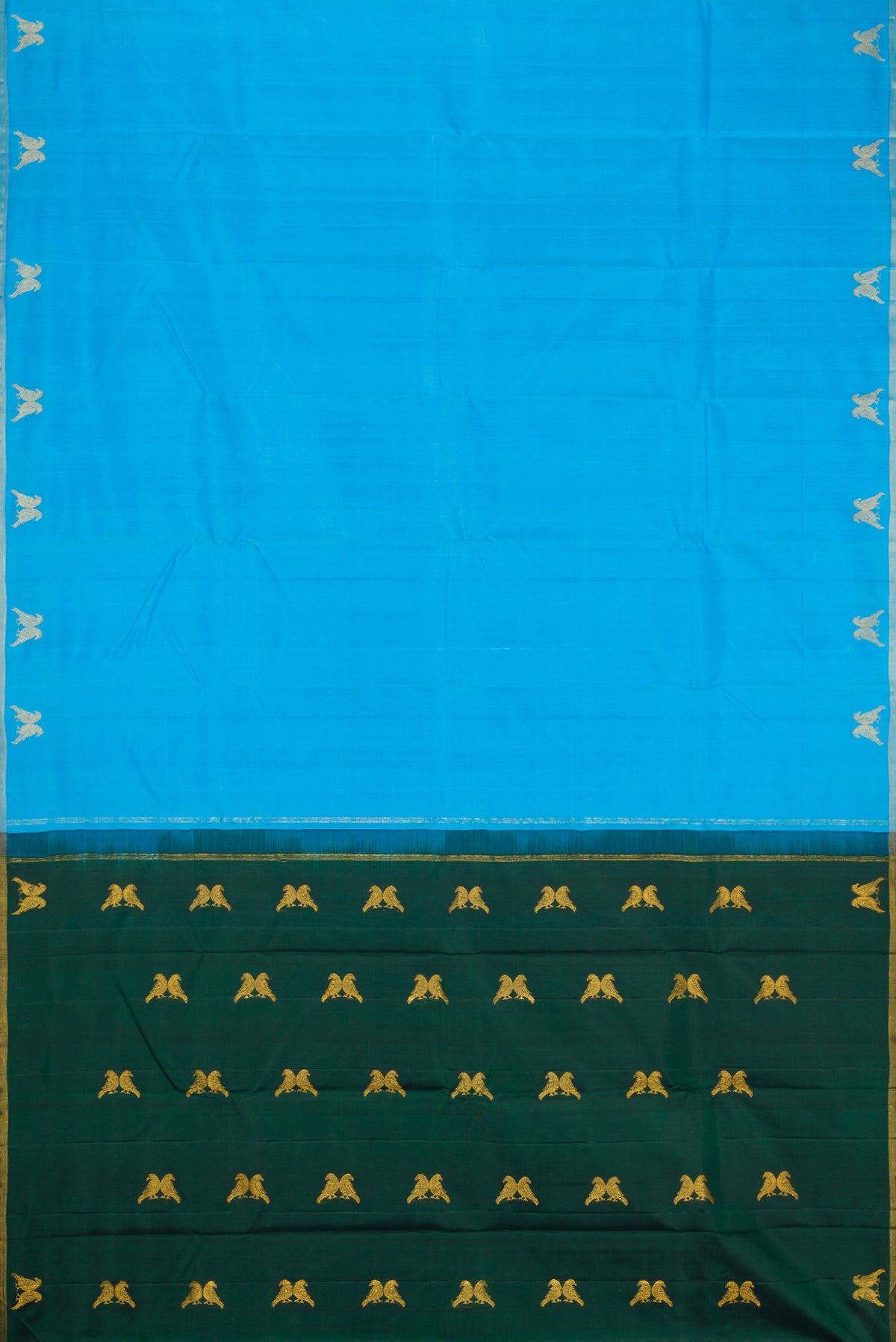 Flat view of Sky Blue Dual Tone Kanchipuram Silk Saree with Plain Body and Fancy Border. 