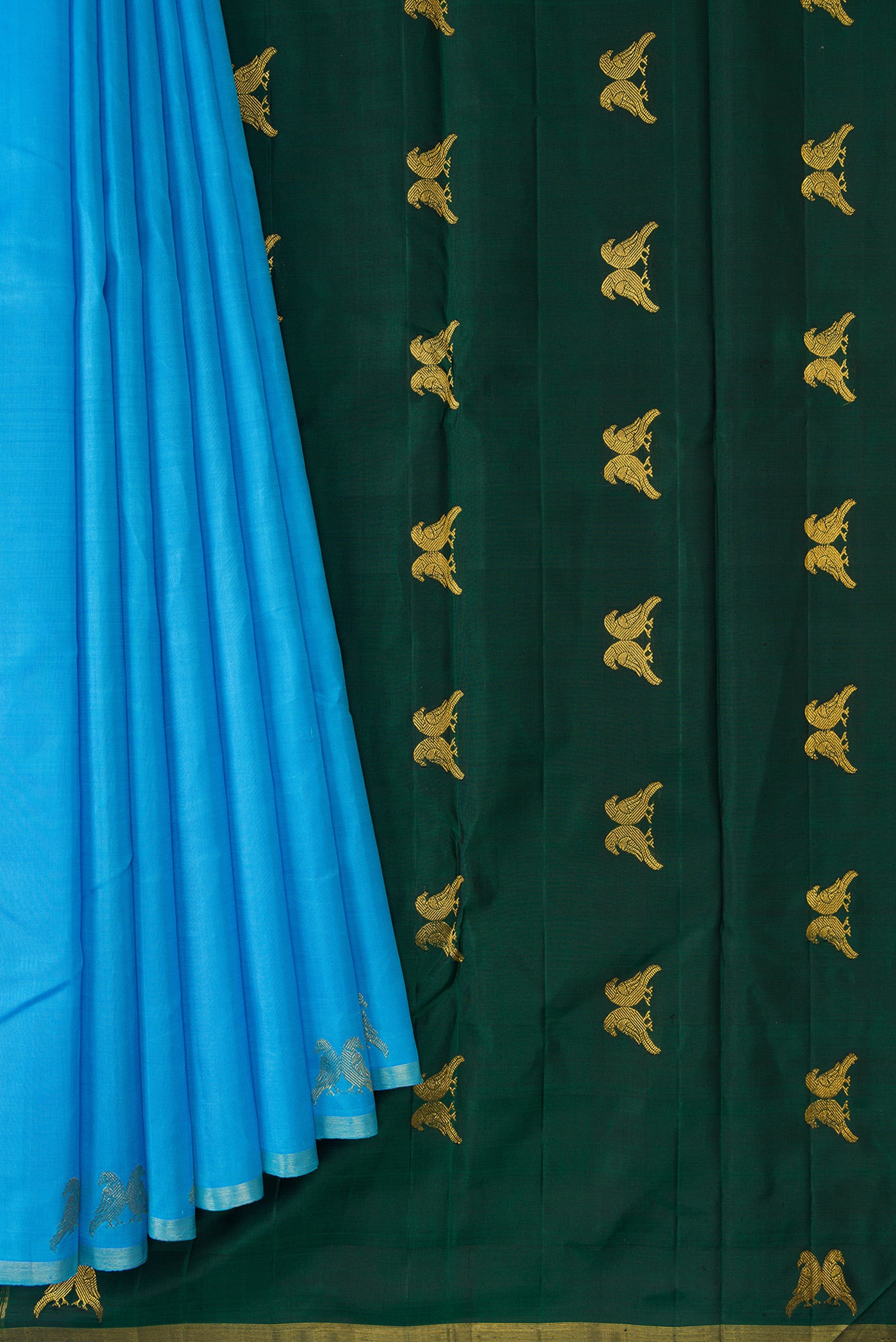 Pleats and pallu of Sky Blue Dual Tone Kanchipuram Silk Saree with Plain Body and Fancy Border. 