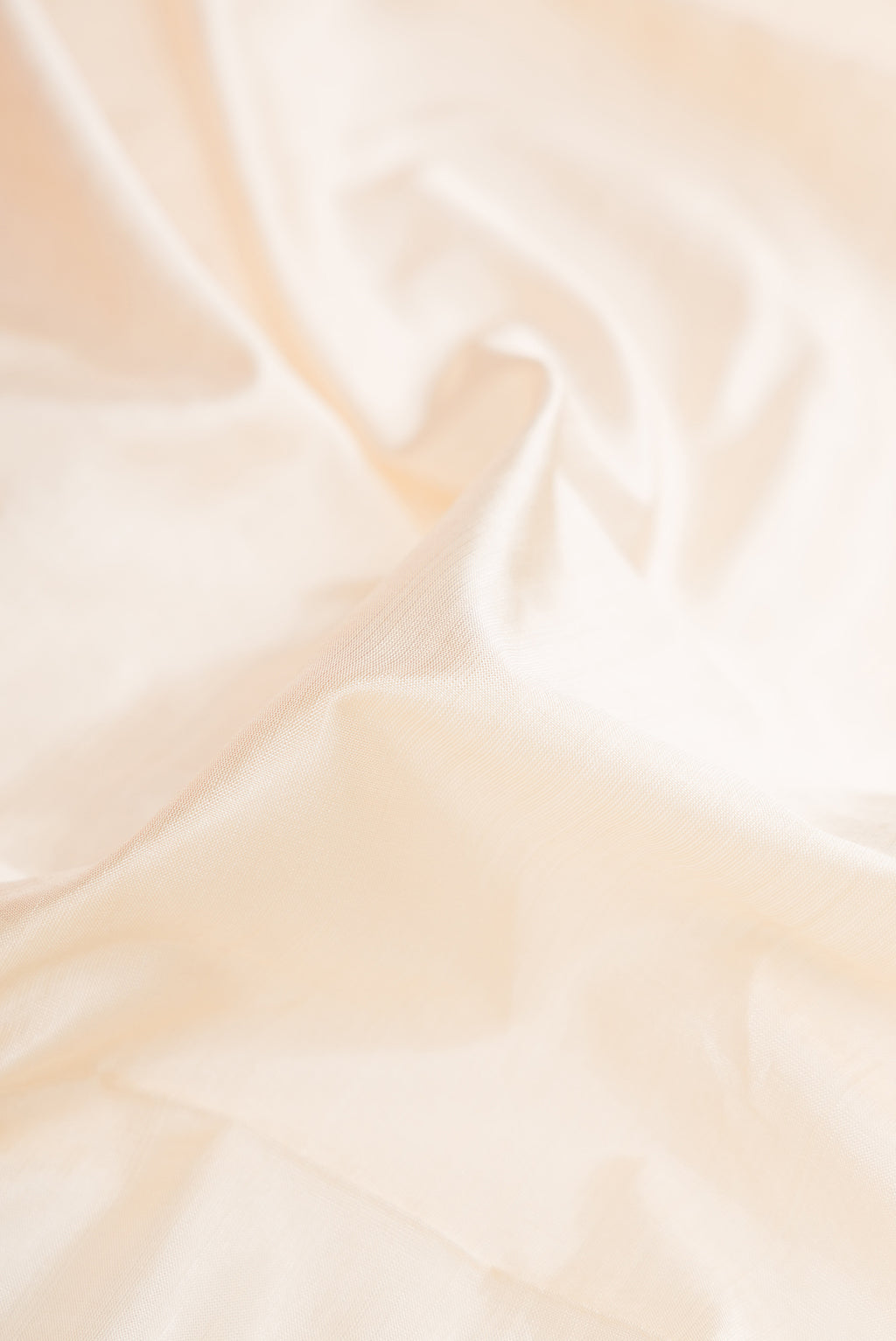 Close up of Sandal Dual Tone Kanjivaram Silk Nine Yards Saree with Plain Body and Zari Border.  displaying folds