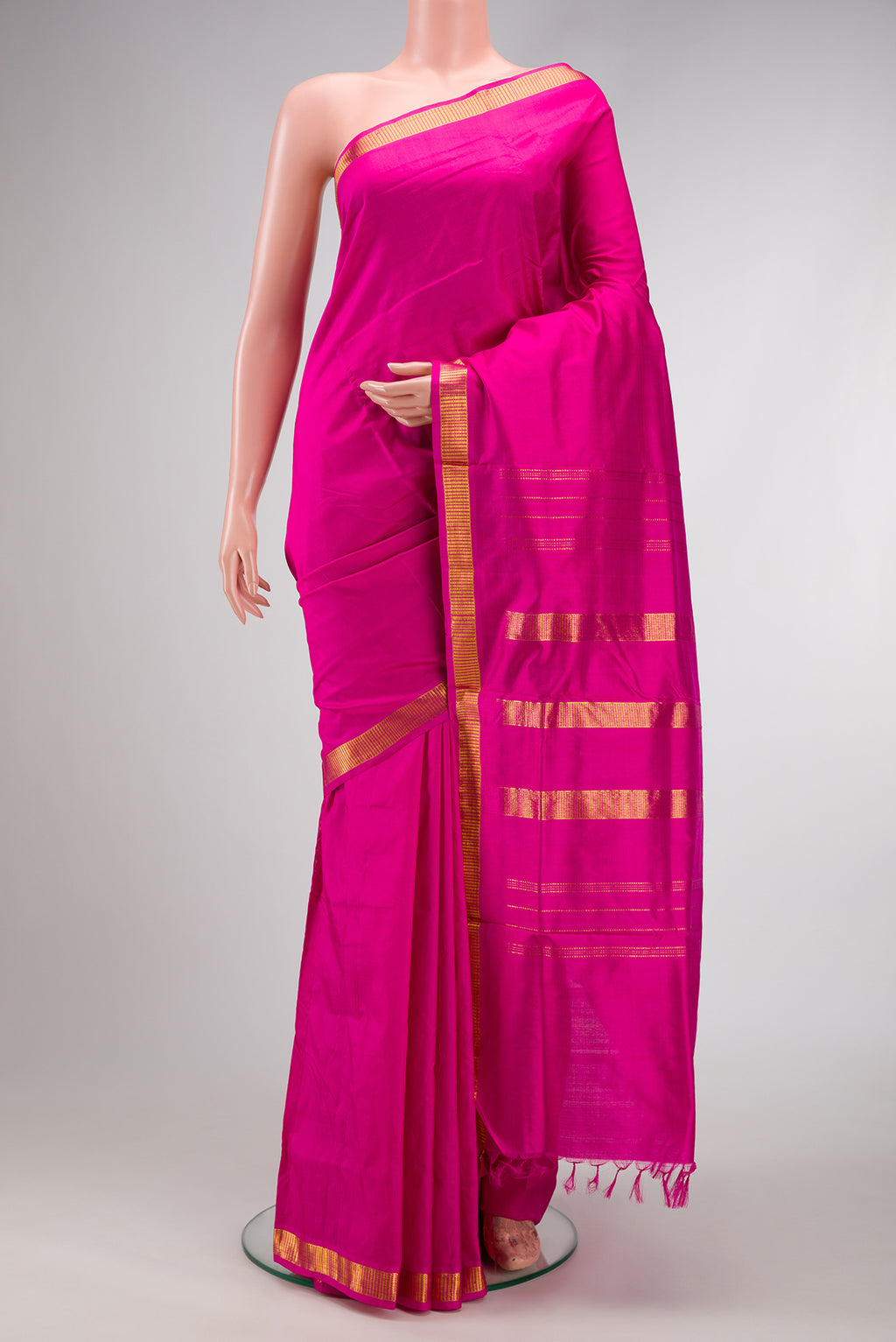 Dark Pink Dual Tone Kanjivaram Silk Nine Yards Saree with Plain Body and Zari Border.  displayed on a mannequin