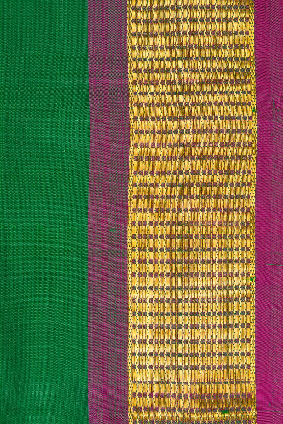 Border image of Bottle Green Dual Tone Kanchipuram Silk Nine Yards Saree with Plain Body and Zari Border. 